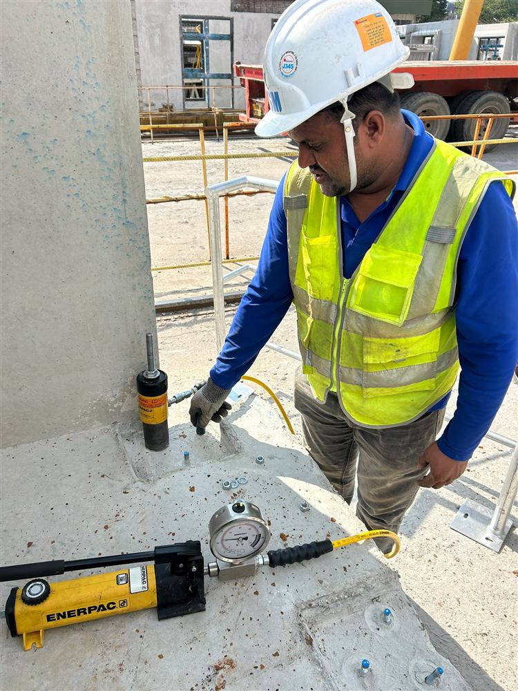 On-site Anchor Pull Out Test with hydraulic pump and gauge in Singapore